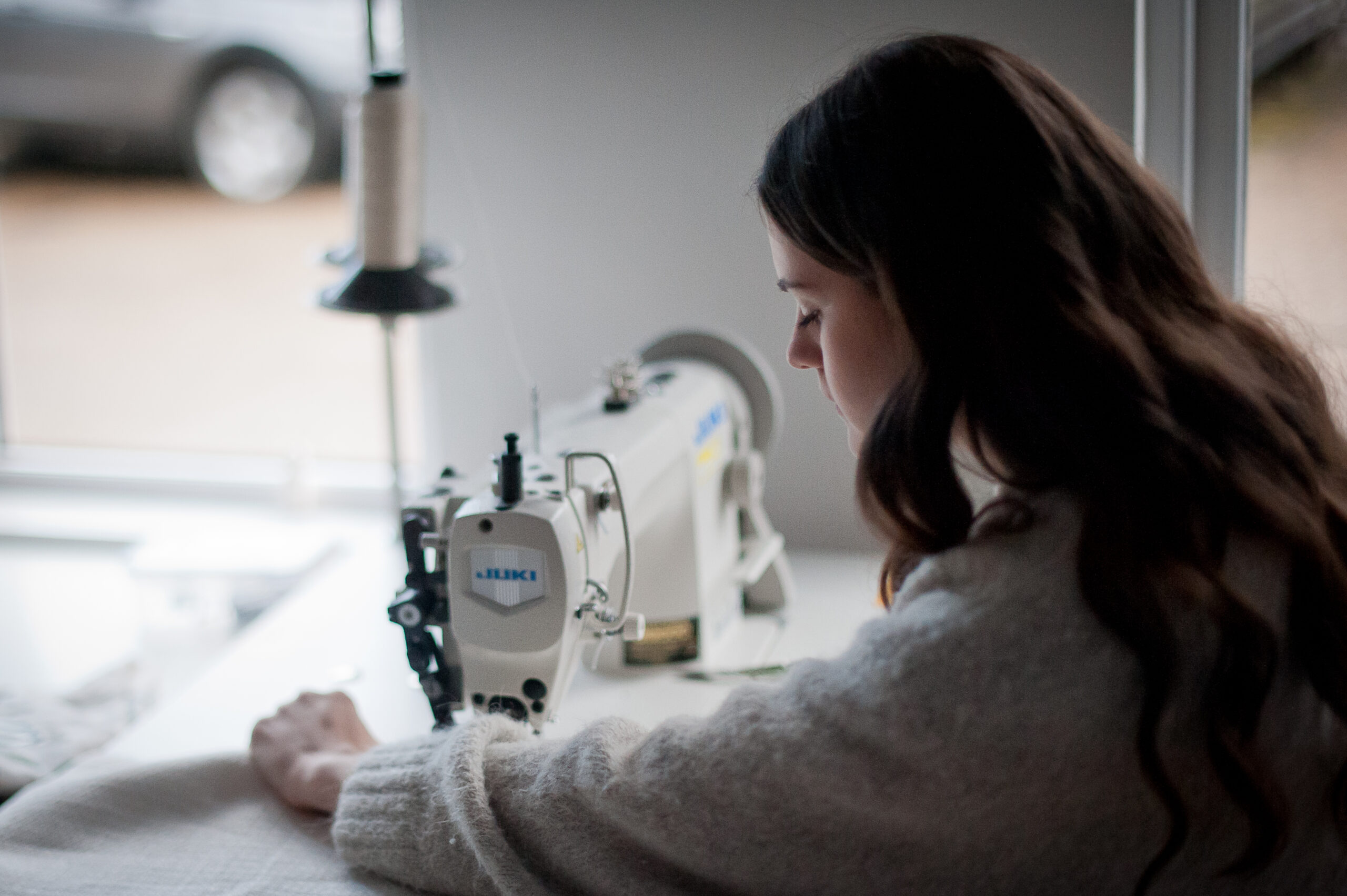 Susie Wigg team working on Sewing machine