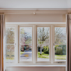 Haslemere Drawing Room - cream made to measure curtains, triple pleat heading on painted wooden pole, Romo Linara Haslemere Drawing Room - cream made to measure curtains, triple pleat heading on painted wooden pole, Romo Linara