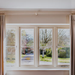 Haslemere Drawing Room - cream made to measure curtains, triple pleat heading on painted wooden pole, Romo Linara Haslemere Drawing Room - cream made to measure curtains, triple pleat heading on painted wooden pole, Romo Linara