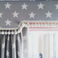 Curtains, blind and pelmet with decorative pom pom edging